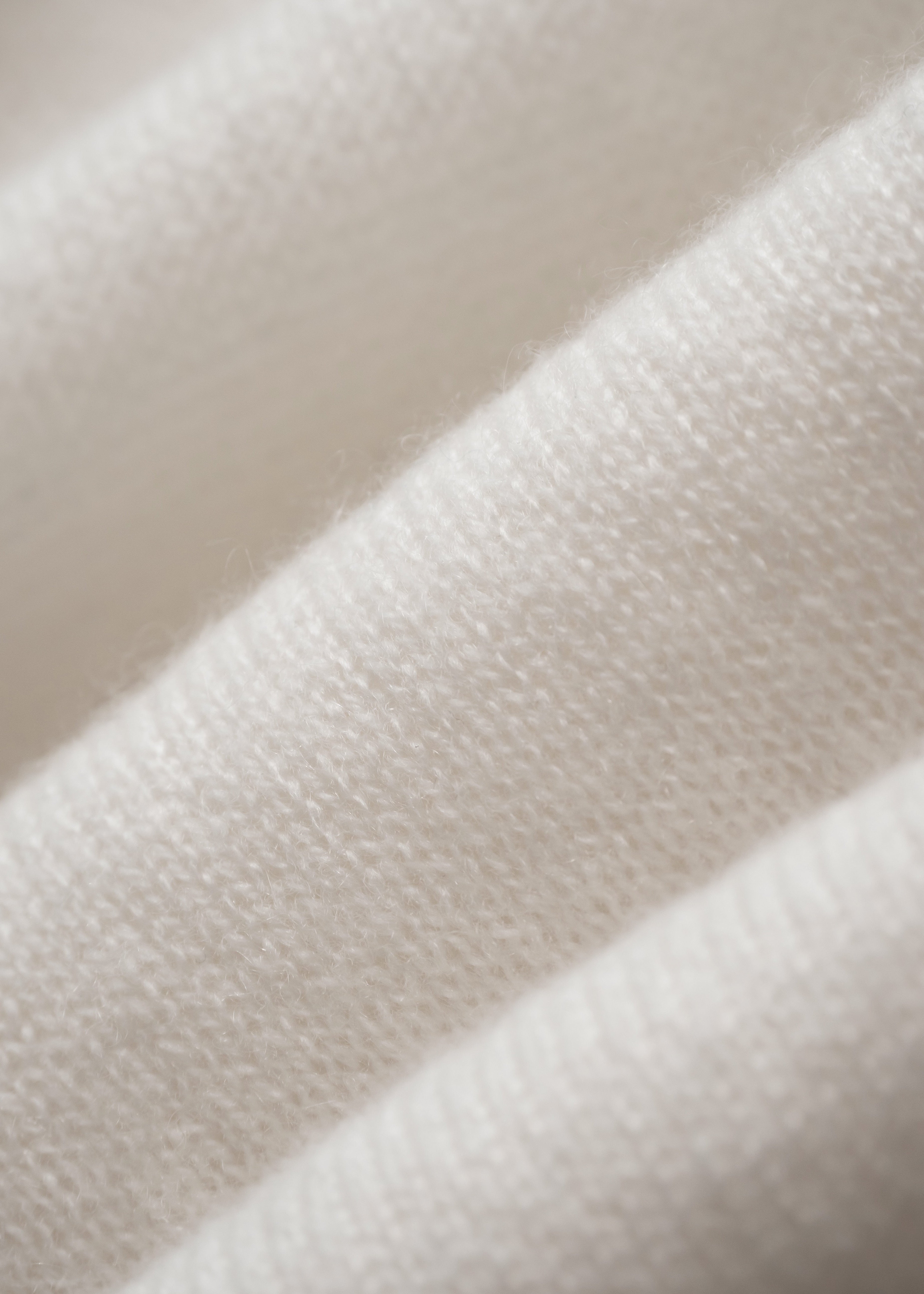 Close-up of textured beige fabric