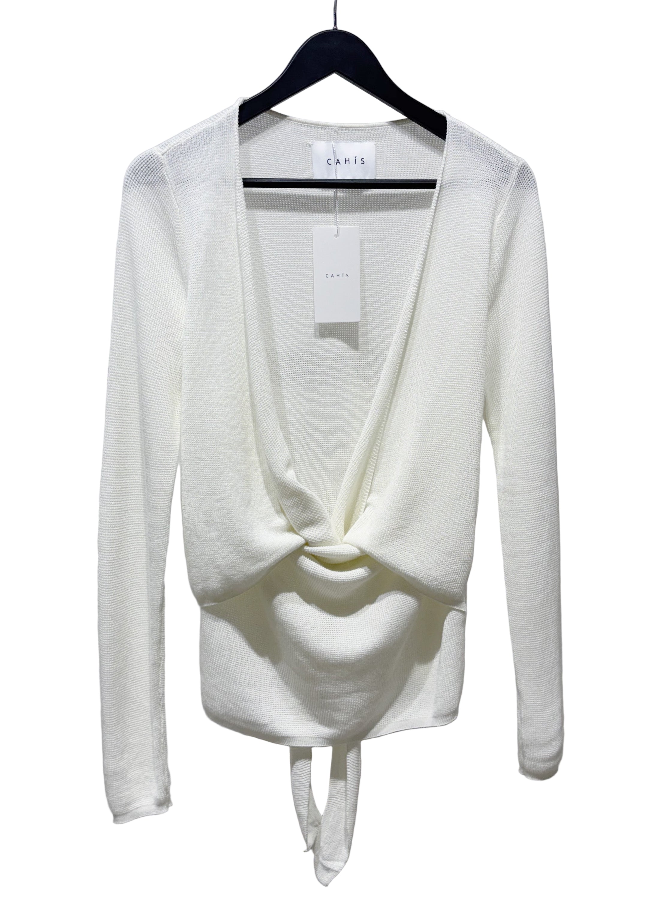 White long-sleeve top with a knot detail on a hanger against a white background