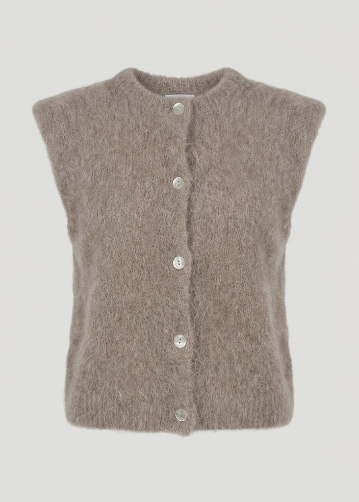 Brown sleeveless knitted vest on a light gray background