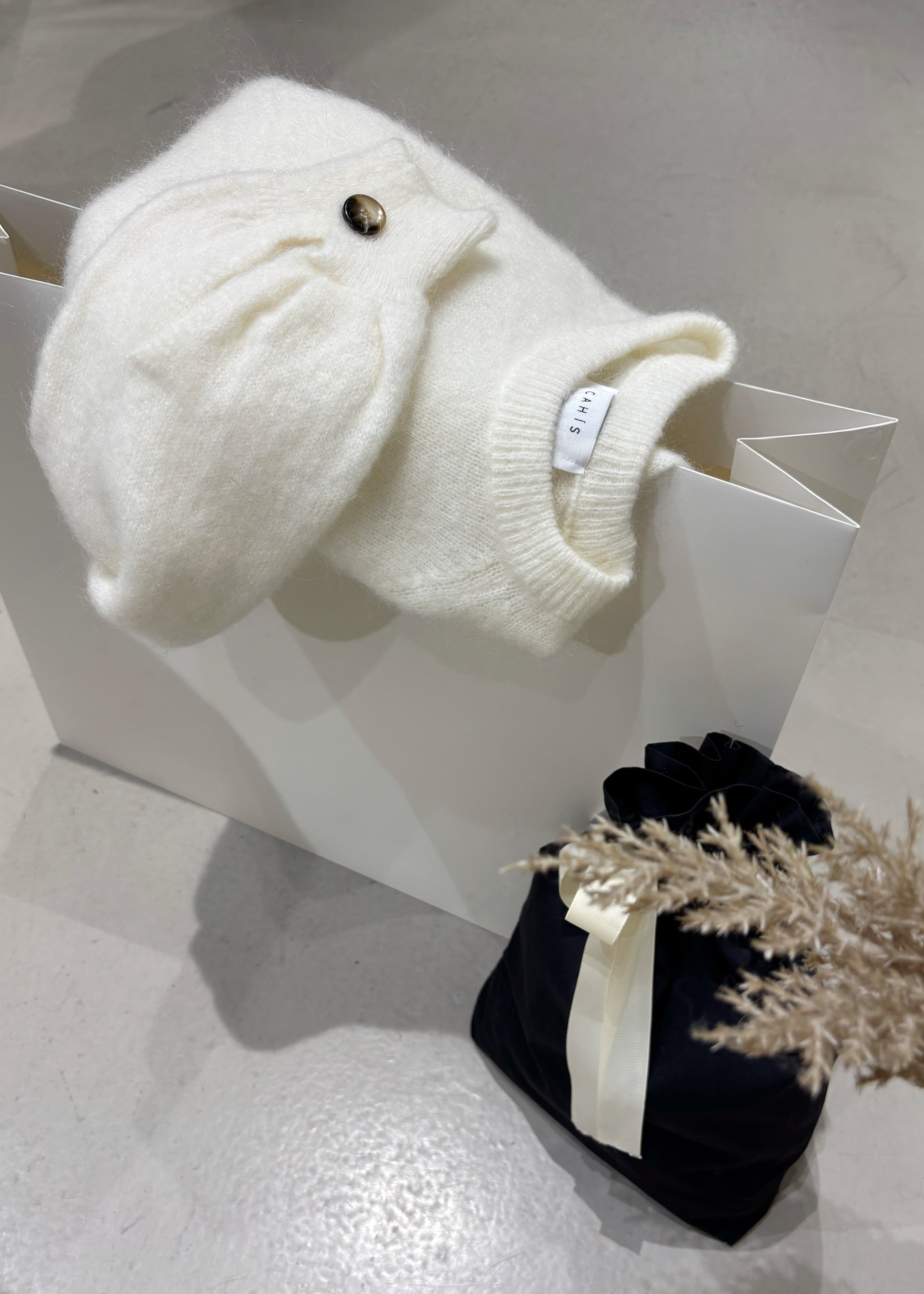 White knitted sweater