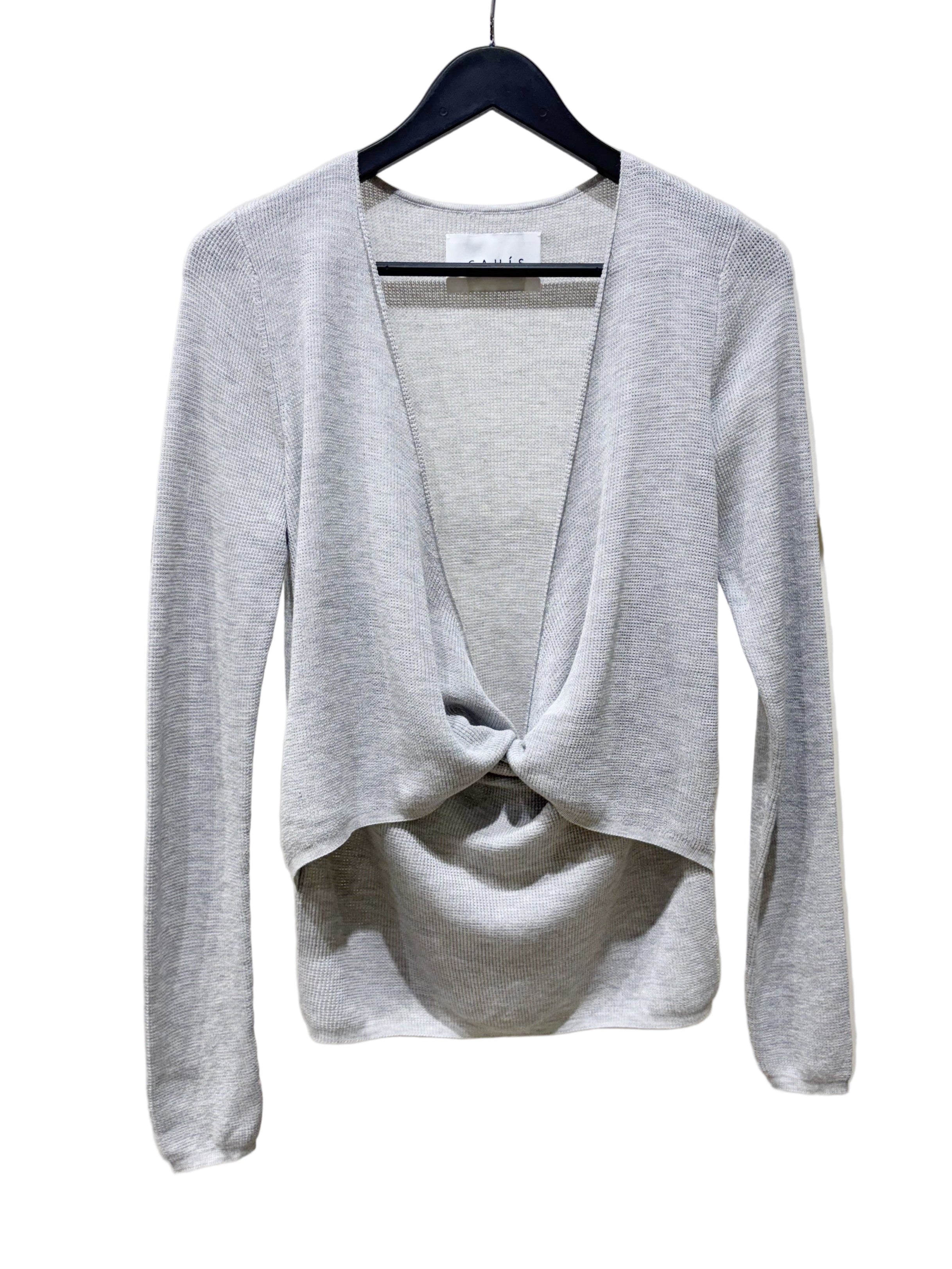 Gray cardigan with a knot detail on a hanger against a white background