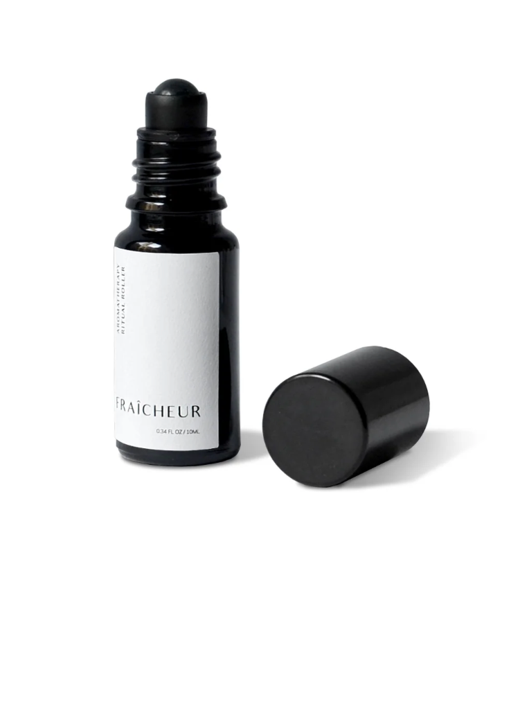 Black and white bottle with a label on a white background